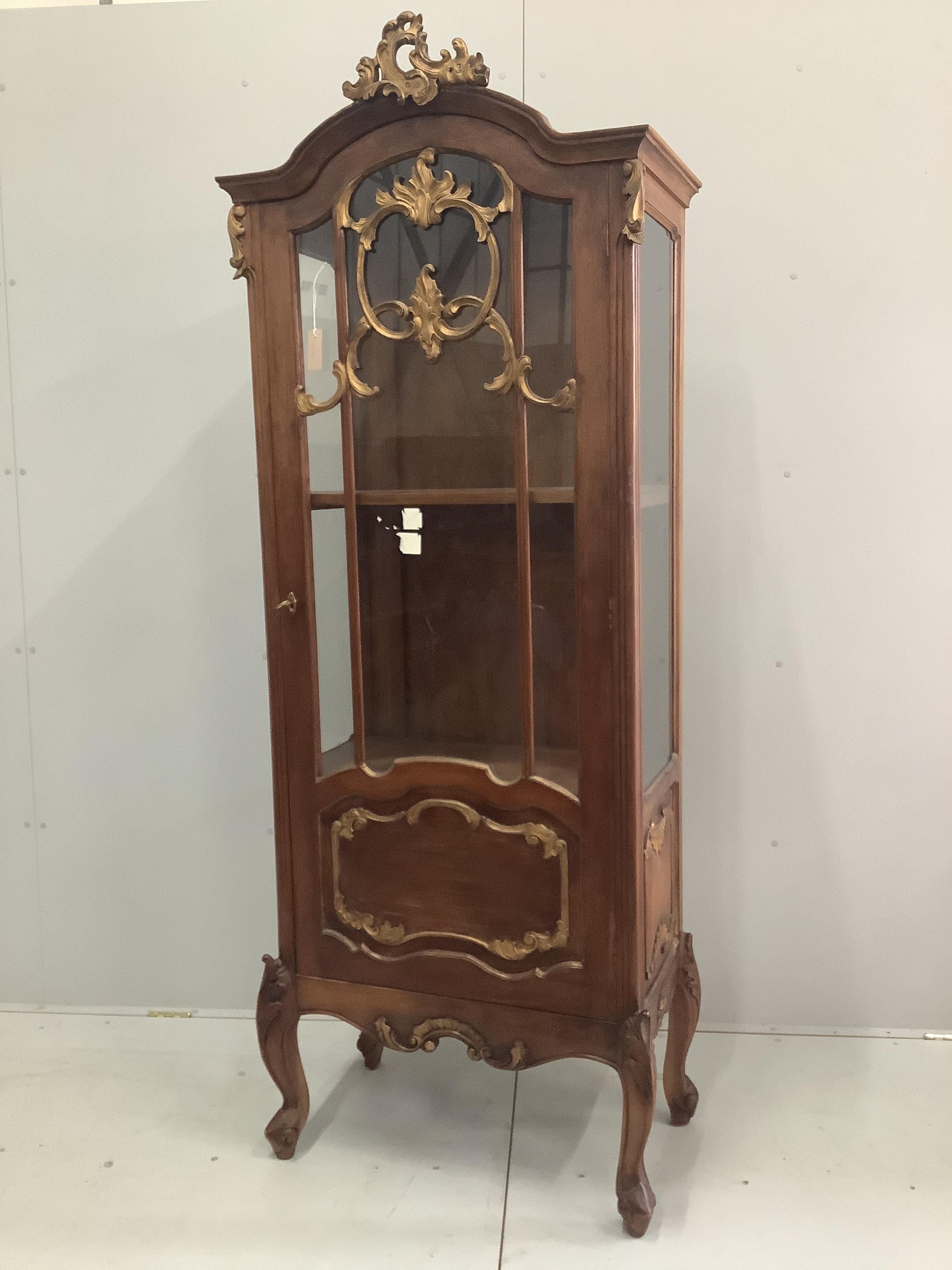 A French parcel gilt walnut display cabinet, width 76cm, depth 44cm, height 207cm